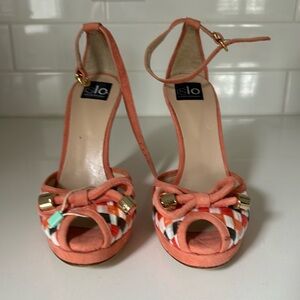Size 35. Peep toe heels. Never worn. Coral suede and woven raffia